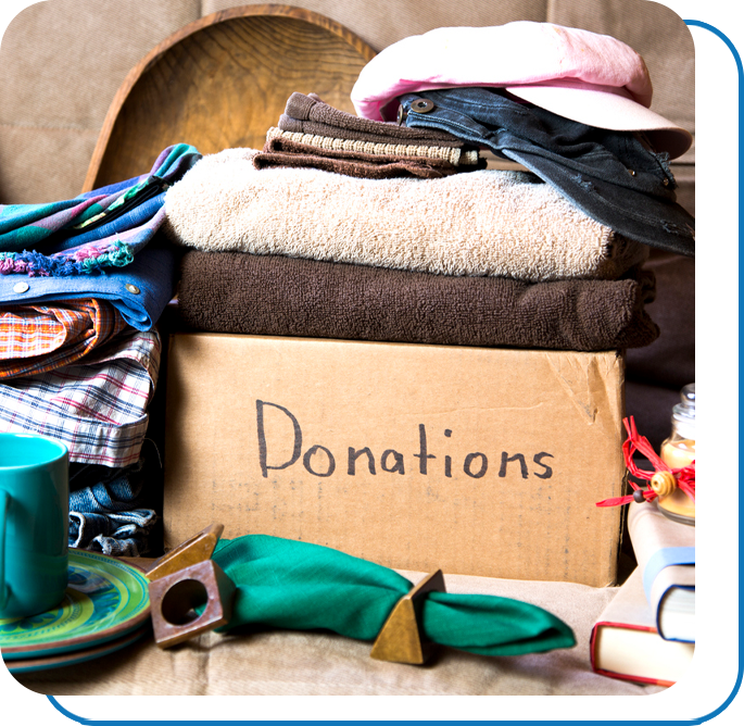 A box labelled "donations" filled with items for donation
